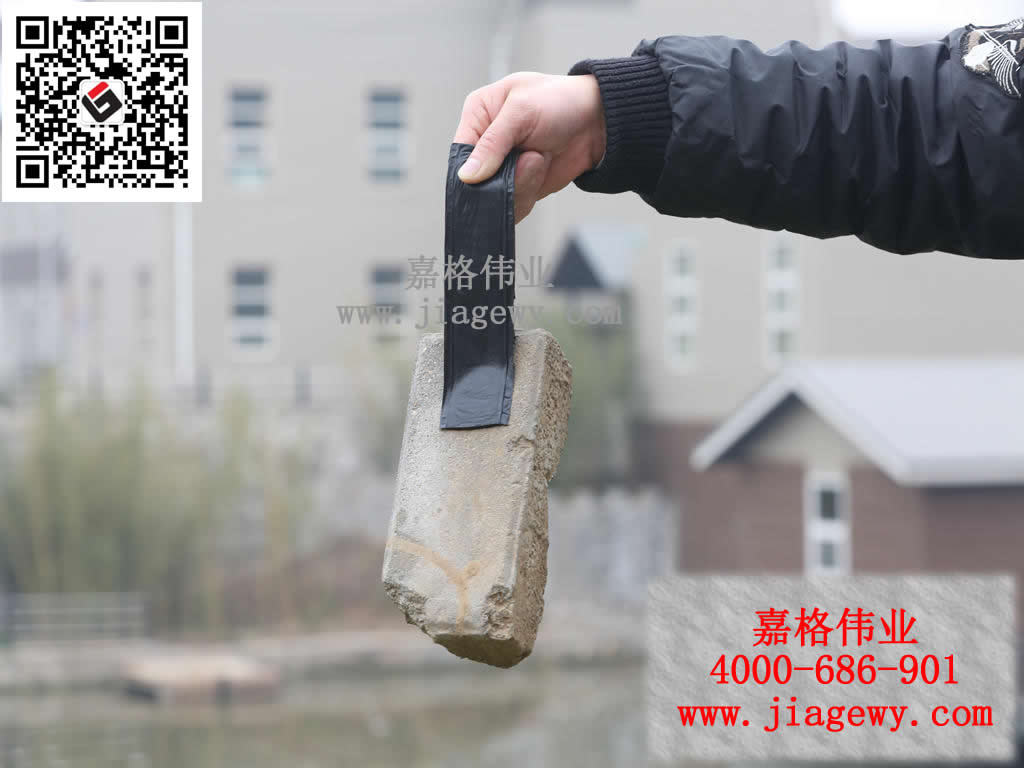 瀝青貼縫帶吊起水泥磚頭，路面細(xì)微裂縫,裂縫愈合,瀝青貼縫帶
